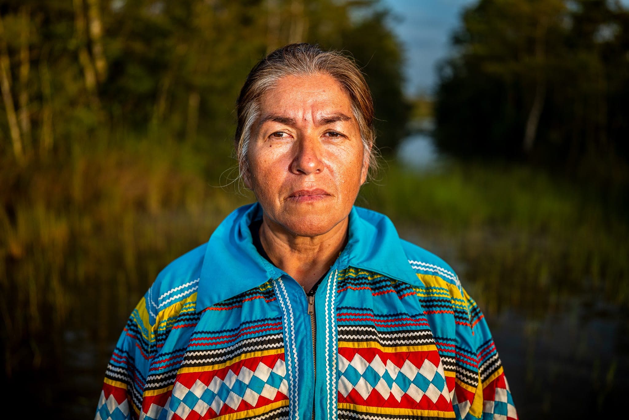 A community elder photographed with warmth — the human impact a foundation's grant makes possible
