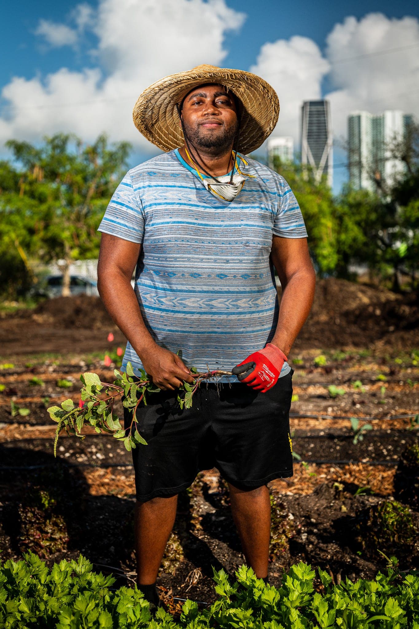 A farmer in the field — the kind of subject whose story doubles as evidence of an NGO's impact